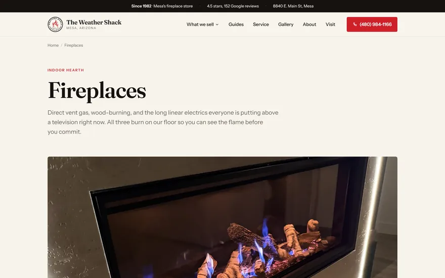 The Weather Shack fireplaces page, the word Fireplaces set large above a photograph of a burning gas fireplace.